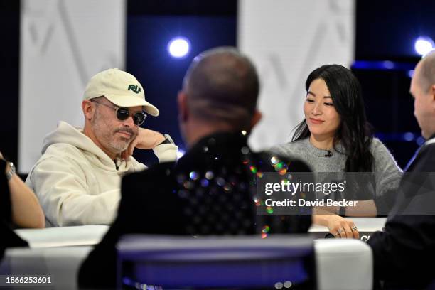 Daniel Arsham and Arden Cho play poker during the World Poker Tour x Daniel Arsham Celebrity Invitational at Wynn Las Vegas on December 18, 2023 in...