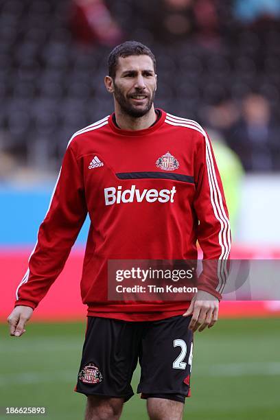 Carlos Cuellar of Sunderland warms up during the Barclays Premier League match between Hull City and Sunderland at KC Stadium on November 02, 2013 in...