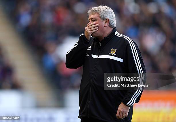 Hull manager Steve Bruce gestures during the Barclays Premier League match between Hull City and Sunderland at KC Stadium on November 2, 2013 in...