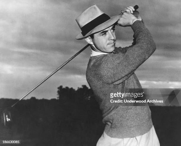 Sam Snead at the end of a golf swing, mid to late 1940s.