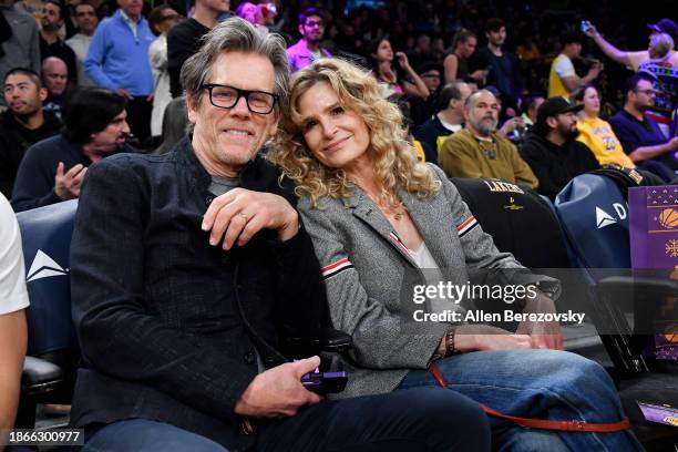 Kevin Bacon and Kyra Sedgwick attend a basketball game between the Los Angeles Lakers and the New York Knicks at Crypto.com Arena on December 18,...