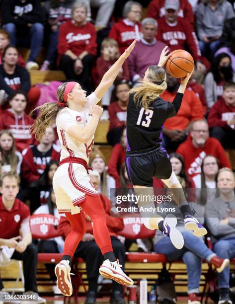 Sara Scalia of the Indiana Hoosiers defends the shot Madlena Gerke of the Evansville Purple Aces in the first half at Simon Skjodt Assembly Hall on...