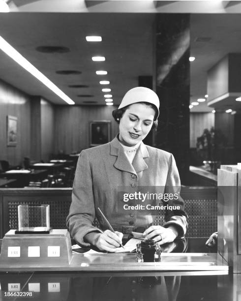 Woman Writecheck 302 Woman Writing A Check Stock Photos, High-Res Pictures, and Images ...