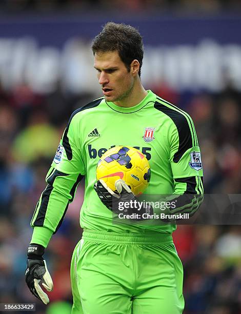 Asmir Begovic of Stoke City holds the match ball during the Barclays Premier League match between Stoke City and Southampton on November 02, 2013 in...