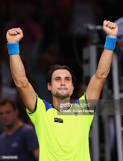 David Ferrer of Spain celebrates defeating Rafael Nadal of Spain during day six of the BNP Paribas Masters at Palais Omnisports de Bercy on November...
