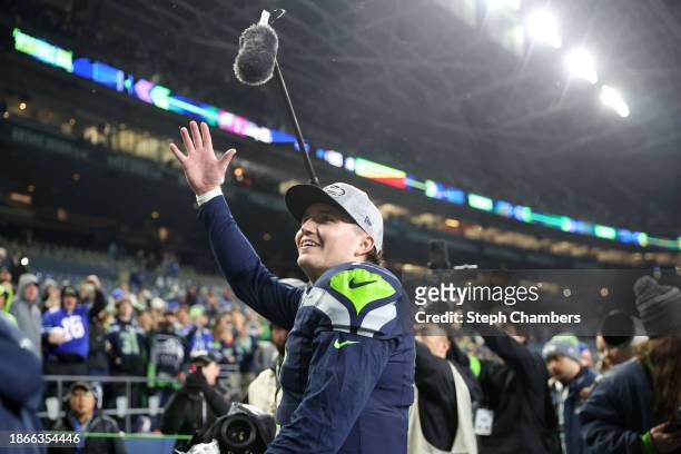 Drew Lock of the Seattle Seahawks celebrates after defeating the Philadelphia Eagles at Lumen Field on December 18, 2023 in Seattle, Washington.