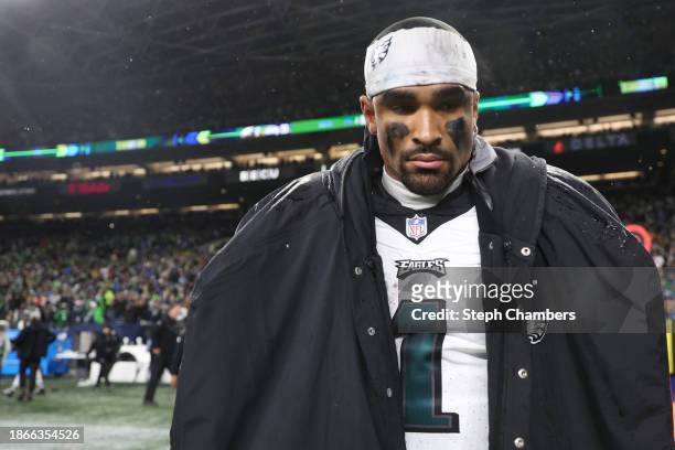 Jalen Hurts of the Philadelphia Eagles walks off the field after the game against the Seattle Seahawks at Lumen Field on December 18, 2023 in...