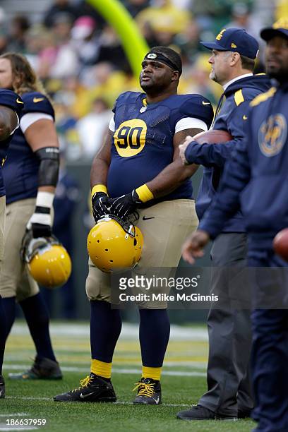 Raji of the Green Bay Packers runs throw drills before the game against the Cleveland Browns during the game at Lambeau Field on October 20, 2013 in...