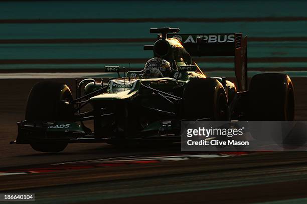Charles Pic of France and Caterham drives during qualifying for the Abu Dhabi Formula One Grand Prix at the Yas Marina Circuit on November 2, 2013 in...