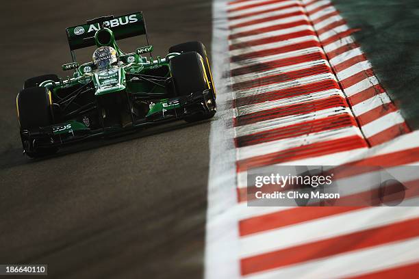 Charles Pic of France and Caterham drives during qualifying for the Abu Dhabi Formula One Grand Prix at the Yas Marina Circuit on November 2, 2013 in...