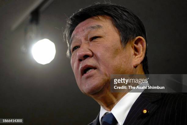 Ruling Liberal Democratic Party secretary general Toshimitsu Motegi speaks during a press conference as Tokyo District Public Prosecutors Office raid...