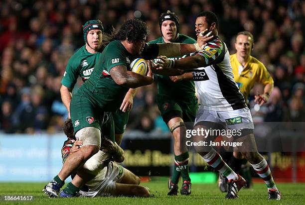 Logovii Mulipola of Leicester Tigers holds of Darryl Marfo of Leicester Tigers during the Aviva Premiership match between Leicester Tigers and...