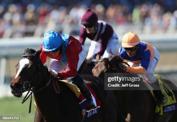 Ryan Moore rides Dank enroute to winning the Filly & Mare Turf during the 2013 Breeders' Cup World Championships at Santa Anita Park on November 2,...