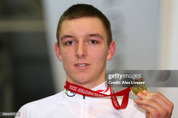 Gold medal winner Jasper De Buyst of Belgium celebrates on the posium after winning the Men's Omnium on day two of the UCI Track Cycling World Cup at...