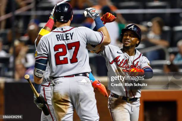 Austin Riley and Ozzie Albies of the Atlanta Braves in action against the New York Mets in game two of a doubleheader at Citi Field on August 12,...