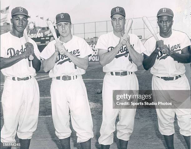 Brooklyn Dodgers Junior Gilliam, Pee Wee Reese, Duke Snider and Jackie Robinson pose in this undated photo.