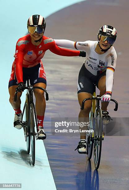 Gold medal winner Kristina Vogel of Germany celebrates alongside silver medal winner Wai Sze Lee of Hong Kong after the Women's Sprint Final on day...