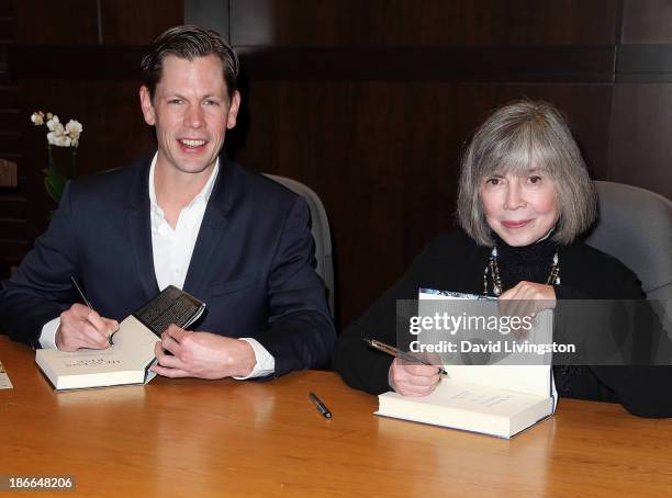 Author Christopher Rice and mother author Anne Rice attend a signing for their books "The Heavens Rise" and "The Wolves of Midwinter" respectively at...