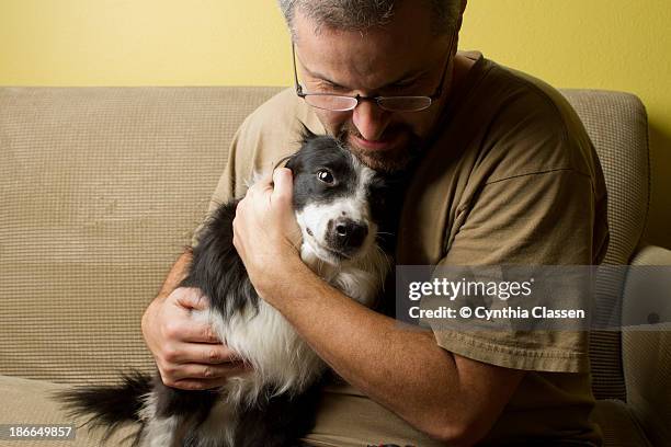 a man and his dog - cynthia classen 個照片及圖片檔