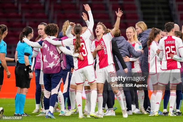 Lotte Keukelaar of AFC Ajax and Isa Kardinaal of AFC Ajax celebrating the win with teammates during the UEFA Women's Champions League match between...