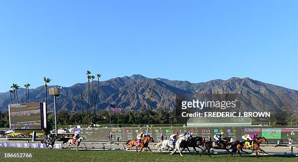Jose Lezcano rides Wise Dan behind the pack but to eventual victory in the Breeder's Cup Mile race at the Santa Anita Racetrack in Arcadia,...
