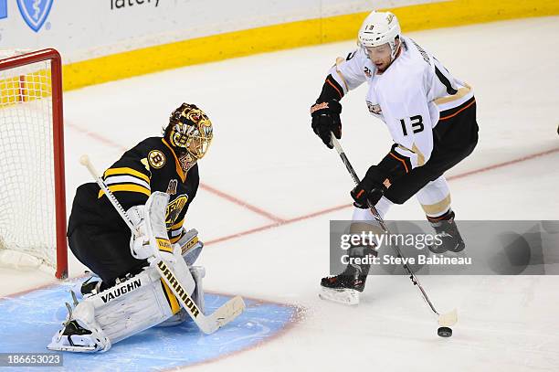 Nick Bonino of the Anaheim Ducks tries to score in a shoot out against Tuukka Rask of the Boston Bruins at the TD Garden on October 31, 2013 in...