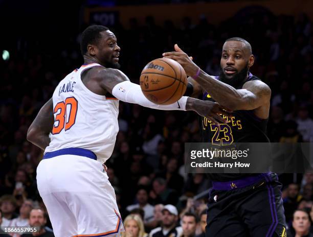 LeBron James of the Los Angeles Lakers loses the ball in front of Julius Randle of the New York Knicks during a 114-109 Knicks win at Crypto.com...
