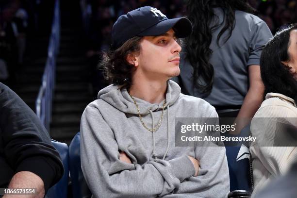 Timothee Chalamet attends a basketball game between the Los Angeles Lakers and the New York Knicks at Crypto.com Arena on December 18, 2023 in Los...