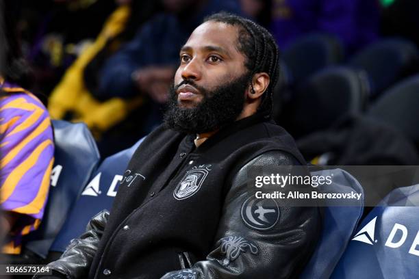 John David Washington attends a basketball game between the Los Angeles Lakers and the New York Knicks at Crypto.com Arena on December 18, 2023 in...