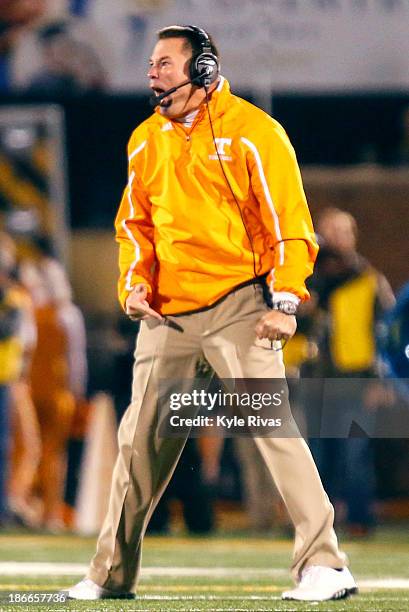 Butch Jones head coach of the Tennessee Volunteers screams at his offense after a delay of game call while taking on the Missouri Tigers defense in...