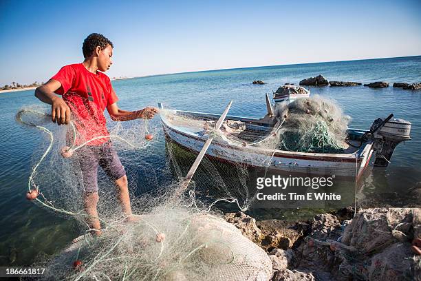 fisherman, djerba tunisia - djerba stock pictures, royalty-free photos & images