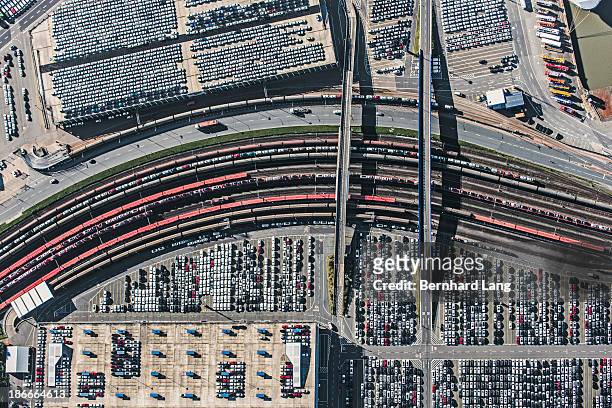rail tracks and car terminals, aerial view - germany train stock pictures, royalty-free photos & images