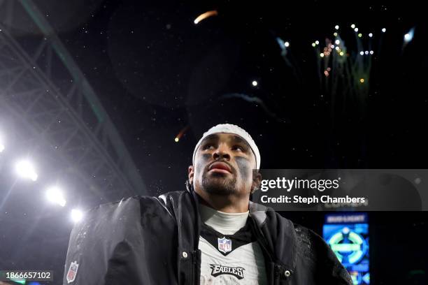 Jalen Hurts of the Philadelphia Eagles walks off the field after the game against the Seattle Seahawks at Lumen Field on December 18, 2023 in...