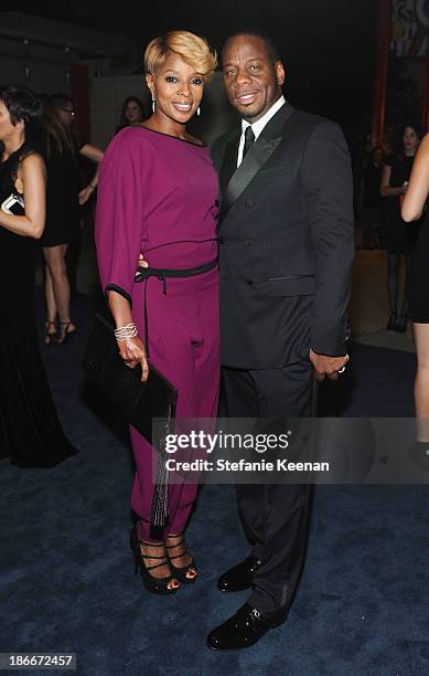 Recording Artist Mary J. Blige and record producer Kendu Isaacs, wearing Gucci, attend the LACMA 2013 Art + Film Gala honoring Martin Scorsese and...