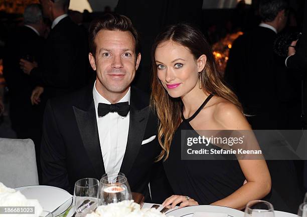 Actor Jason Sudeikis and actress Olivia Wilde, wearing Gucci, attend the LACMA 2013 Art + Film Gala honoring Martin Scorsese and David Hockney...