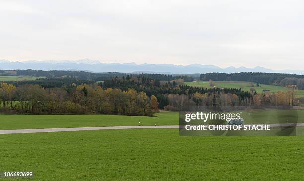 Volkswagen Kombi owner Wanja Fuhrmann drives his Volkswagen T2 camper van built in the year 1975 on a road near Landsberg, southern Germany, on...