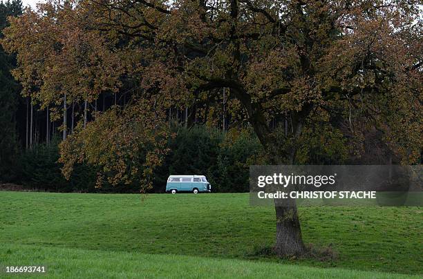 Volkswagen Kombi owner Wanja Fuhrmann drives his Volkswagen T2 camper van built in the year 1975 on a road near Landsberg, southern Germany, on...