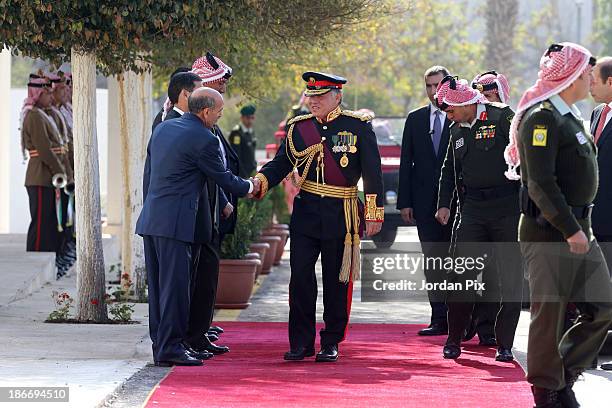 Jordanian King Abdullah II arrives for the throne opening ceremony of the first ordinary session of the 17th Parliament on November 3, 2013 in Amman,...