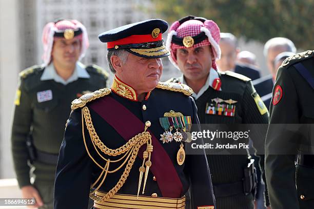 Jordanian King Abdullah II arrives for the throne opening ceremony of the first ordinary session of the 17th Parliament on November 3, 2013 in Amman,...