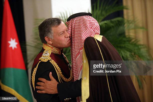 Jordanian King Abdullah II is greeted by a Parliament member during the throne opening ceremony of the first ordinary session of the 17th Parliament...