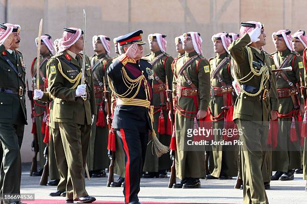 Jordanian King Abdullah II arrives for the throne opening ceremony of the first ordinary session of the 17th Parliament on November 3, 2013 in Amman,...