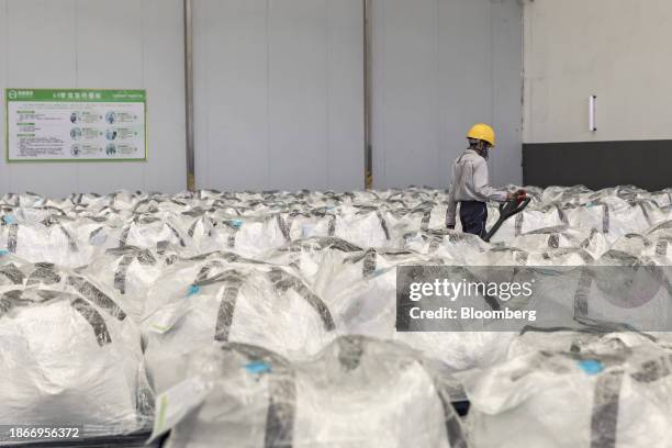 Bags of battery powder, including lithium carbonate, in storage area at a battery recycling facility of Guangdong Brunp Recycling Technology Co., a...