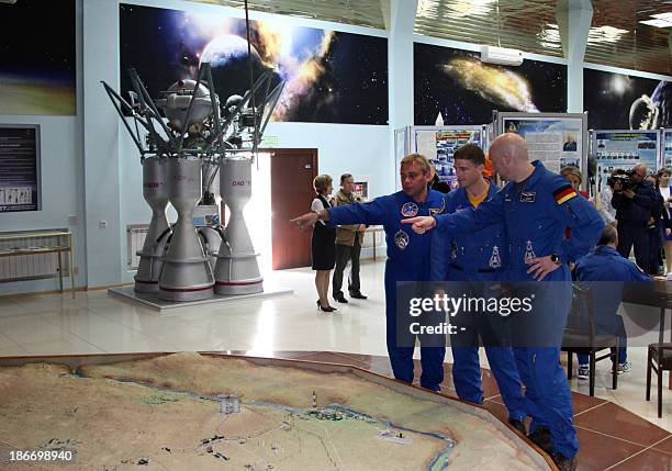 The ISS Expedition 38/39 backup crew mates, Russian cosmonaut Maxim Suraev, US astronaut Greg Wiseman and German astronaut Alexander Gerst, visit a...