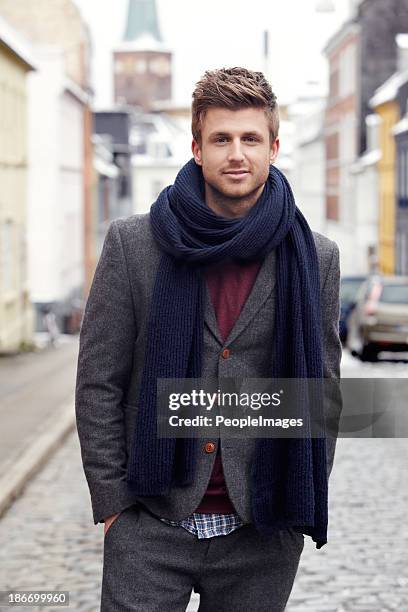 now that is some stylish winter attire... - well dressed man stock pictures, royalty-free photos & images