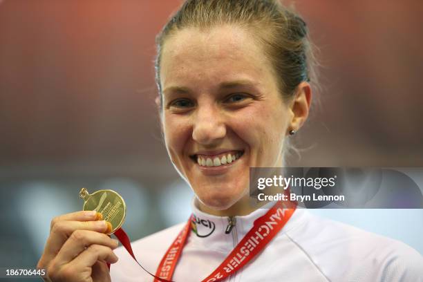 Gold medal winner Laura Brown of Canada celebrates on the podium after the Women's Points Race on day three of the UCI Track Cycling World Cup at...