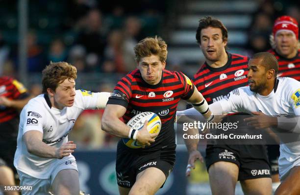 David Strettle of Saracens attacks during the Aviva Premiership match between Saracens and Newcastle Falcons at Allianz Park on November 03, 2013 in...