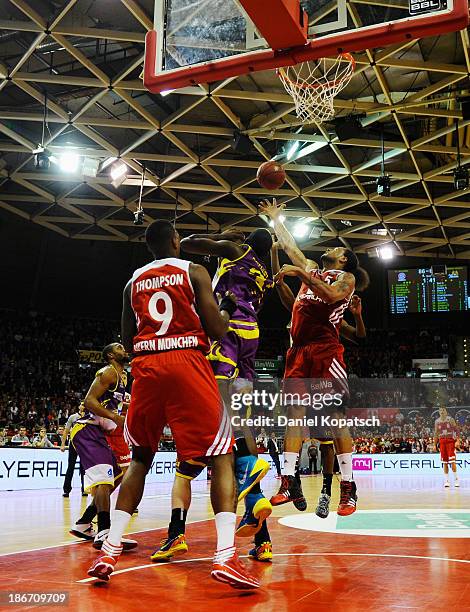 Chevon Troutman of Muenchen is challenged by Dino Gregory of Hagen during the Beko Basketball Bundesliga match between FC Bayern Muenchen and Phoenix...