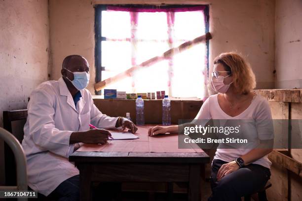 Drugs for Neglected Disease biologist Dr Sabine Specht works with her Congolese colleagues to examine people for symptoms of river blindness. She is...