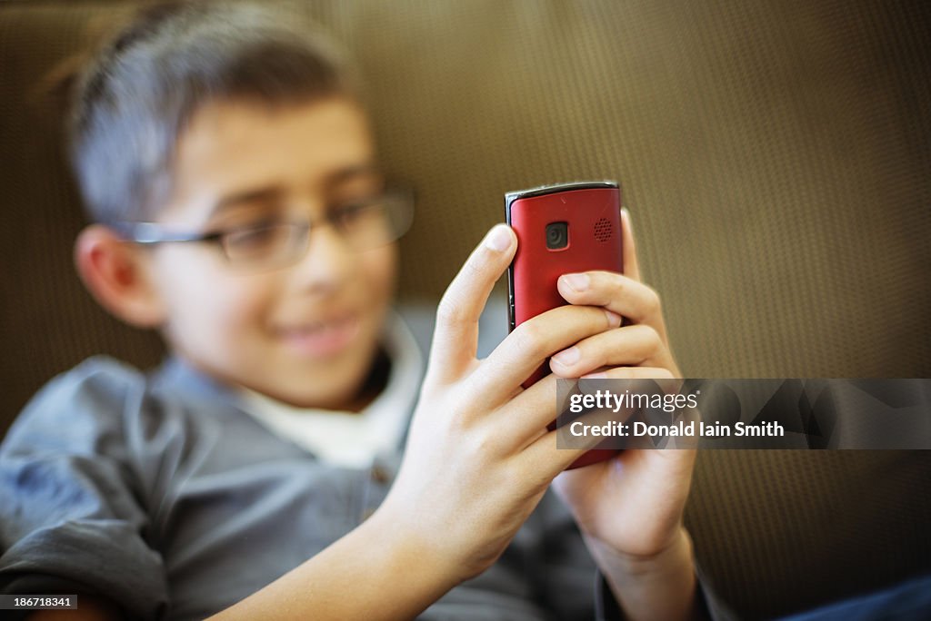 Boy using smartphone