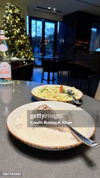 Mansaf Bil Lamheh, a traditional Jordanian turmeric rice with pine nuts and lamb in a yogurt curry, at Olea, a contemporary Levantine restaurant with...